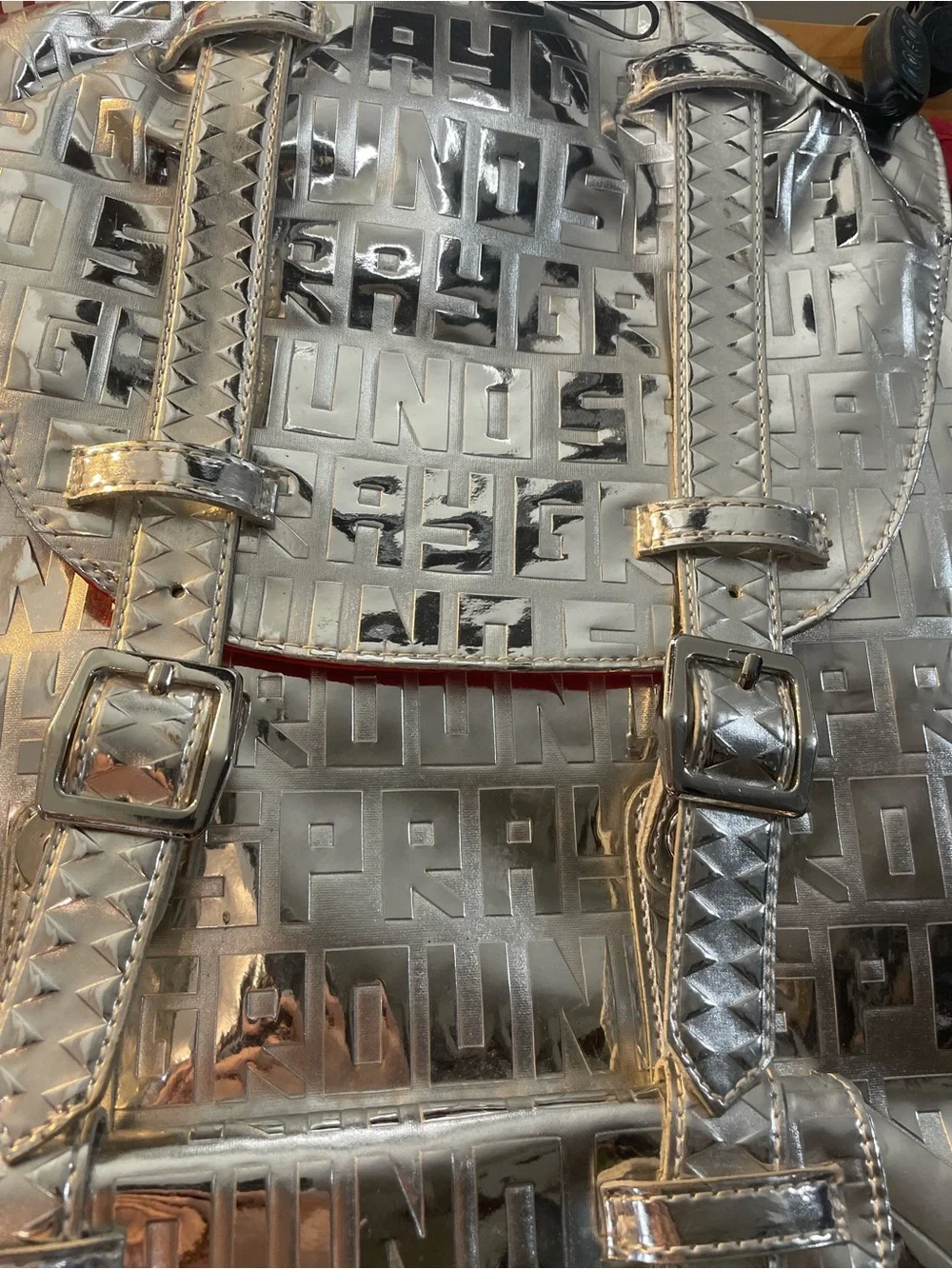 Sprayground Metallic Silver Logo Backpack with Red Accents